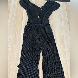 Black polka dot romper